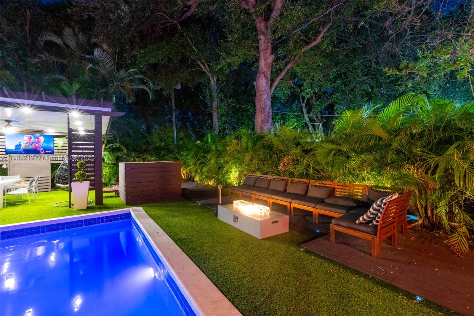 710 Northeast 141st Street North Miami, FL 33161 - Photo 76 of 78 a view of an outdoor sitting area with chairs