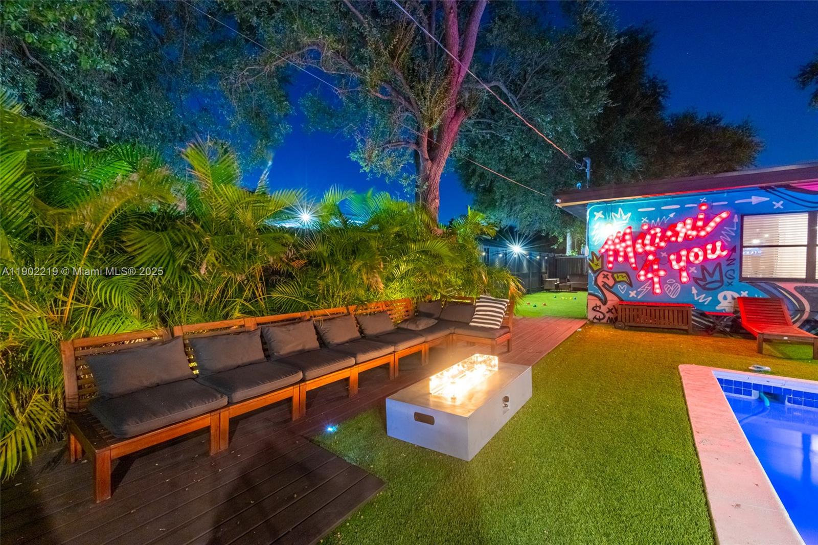 710 Northeast 141st Street North Miami, FL 33161 - Photo 77 of 78 a view of a chairs and tables in the patio