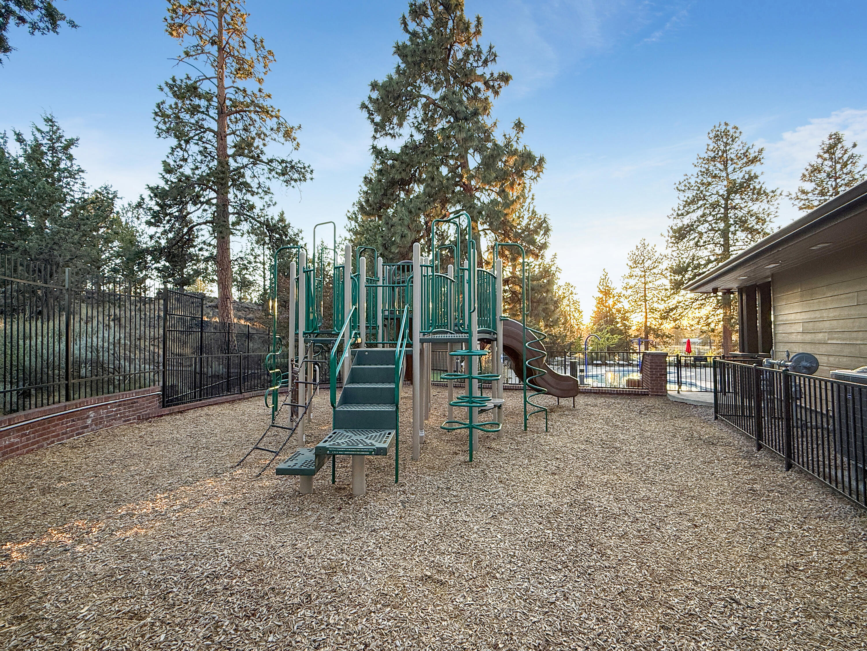61072 Manhae Loop Bend, OR 97702 - Photo 59 of 63 a view of outdoor space with swings