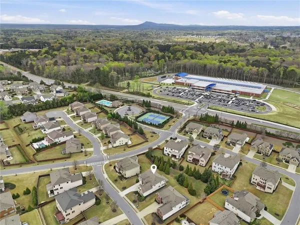an aerial view of a building with garden