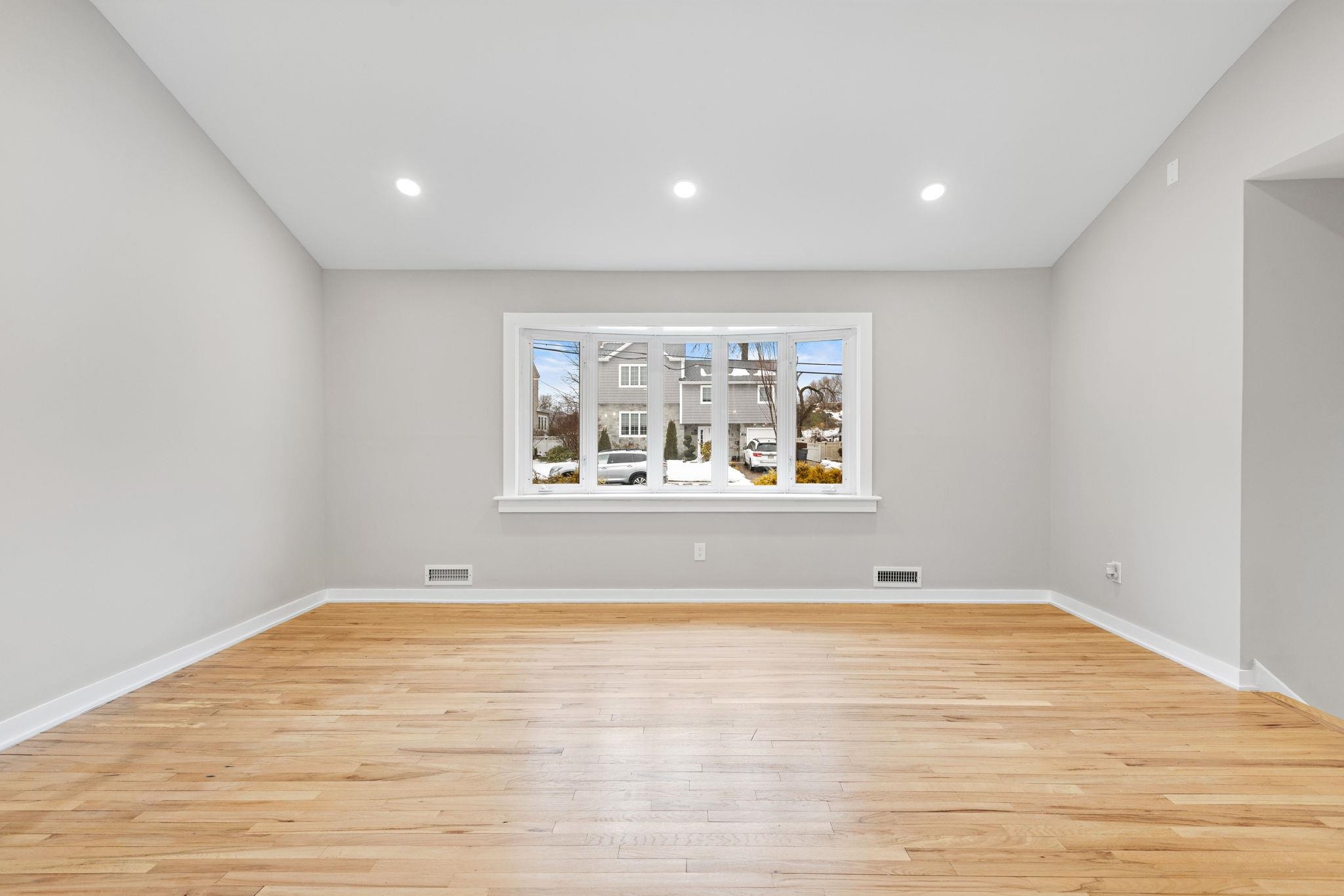 125 Rutgers Place Clifton, NJ 07013 - Photo 6 of 36 an empty room with window