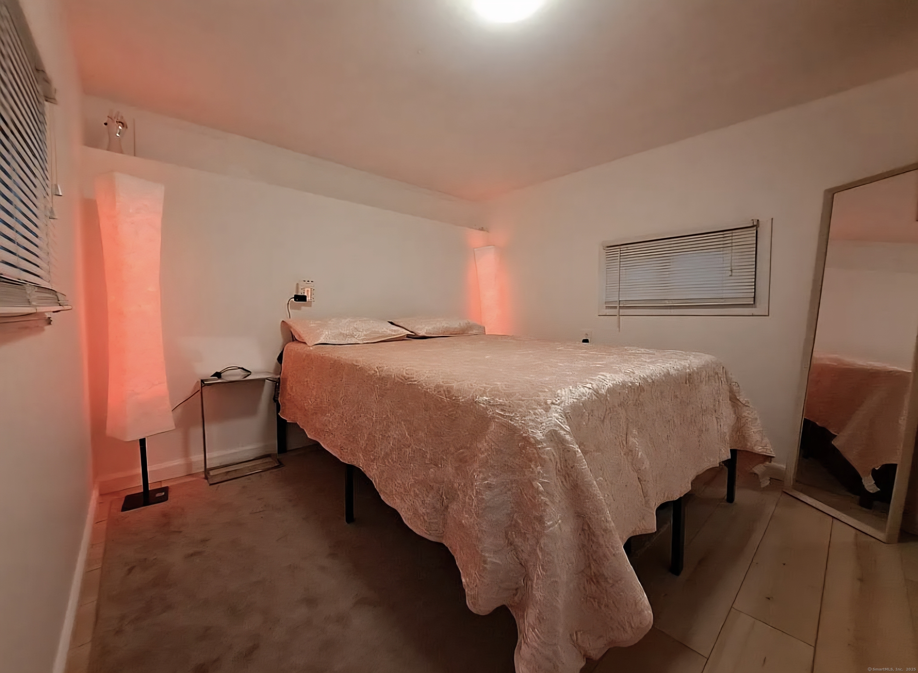 8 Cook Terrace Westbrook, CT 06498 - Photo 10 of 12 a bedroom with a bed and a window