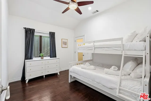 a room with a bed and a window