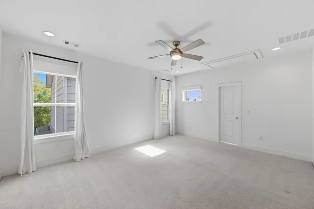 a view of a sink and a refrigerator in a room