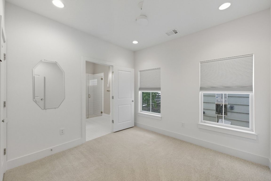 1010 Muse Lane, Unit 15 Austin, TX 78702 - Photo 16 of 22 an empty room with windows