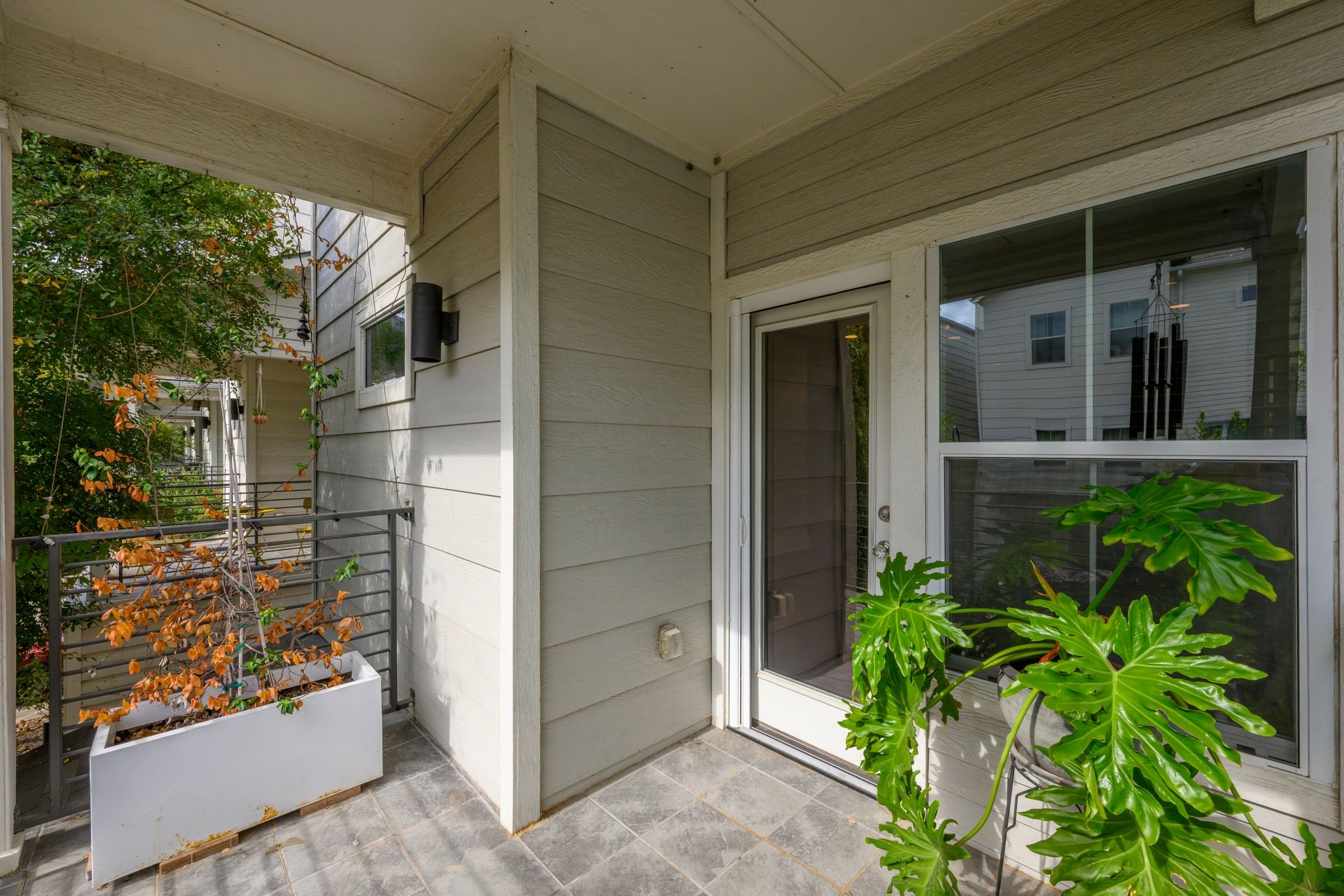 1010 Muse Lane, Unit 15 Austin, TX 78702 - Photo 21 of 22 front view of a house with a glass door