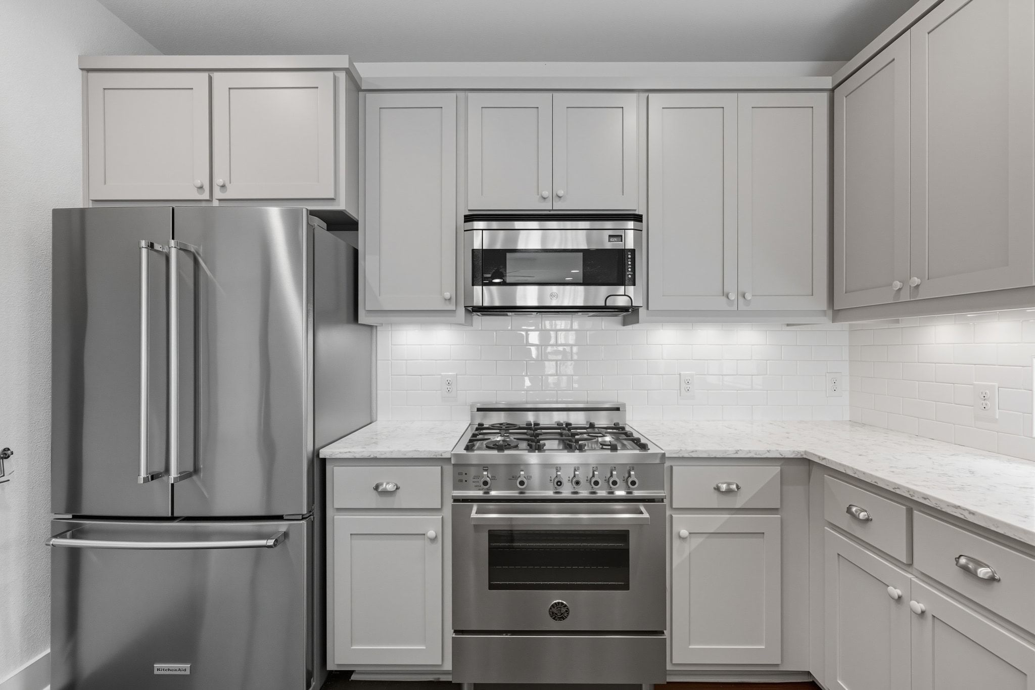 1010 Muse Lane, Unit 15 Austin, TX 78702 - Photo 7 of 22 a kitchen with cabinets stainless steel appliances and cabinets