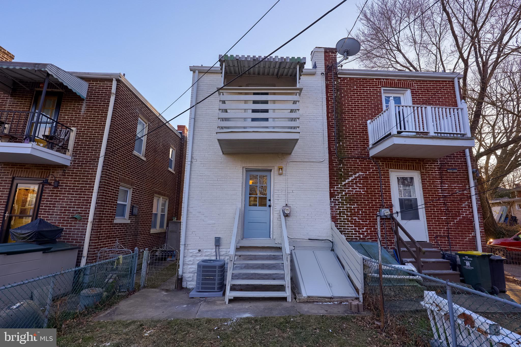 839 George Street Lancaster, PA 17603 - Photo 19 of 20 a front view of a house with a garden