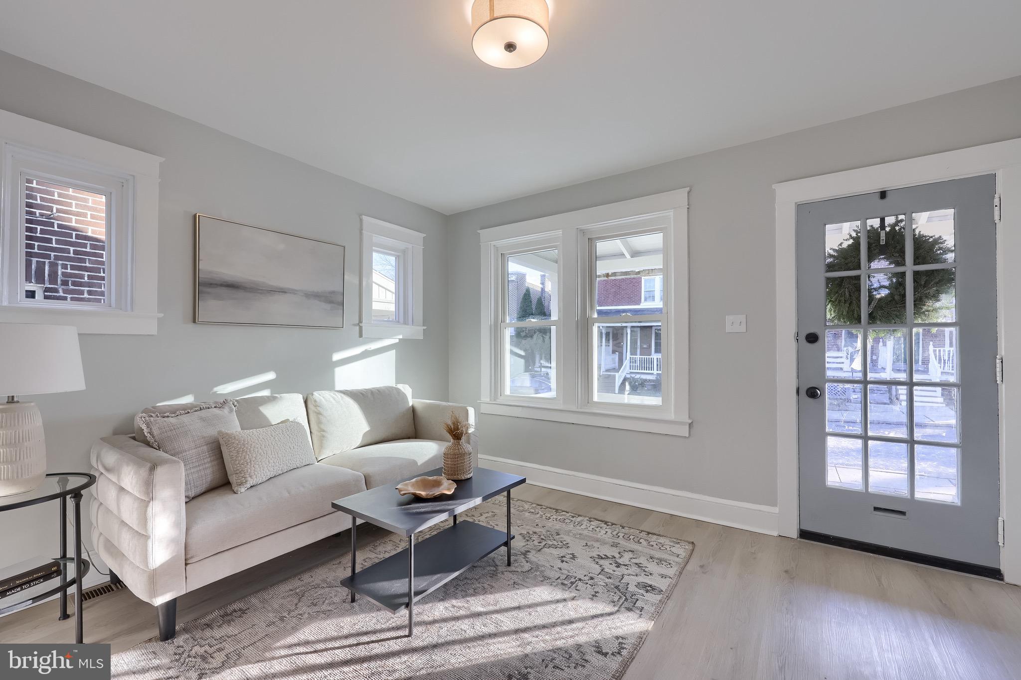 839 George Street Lancaster, PA 17603 - Photo 3 of 20 a living room with furniture and a window