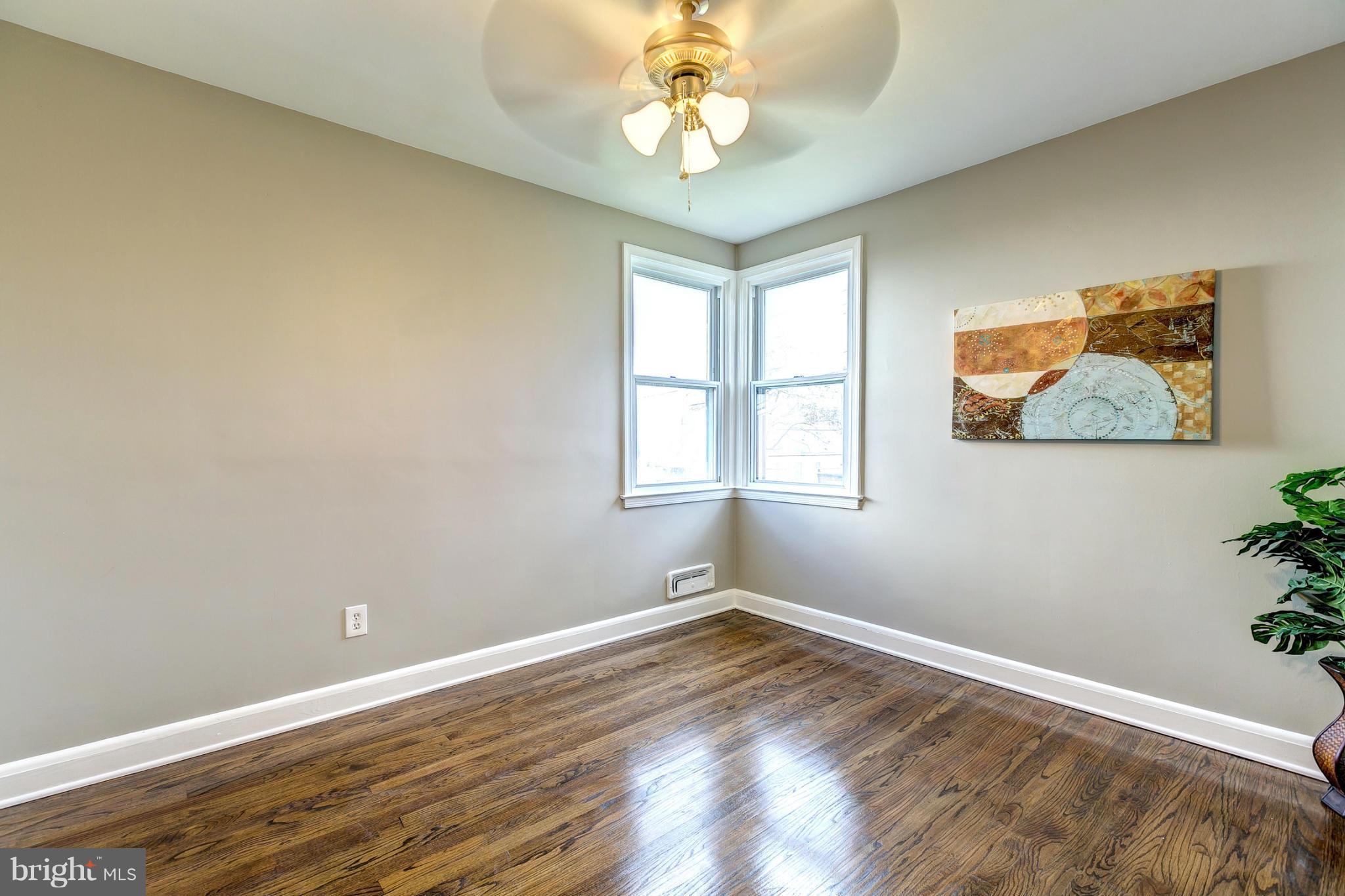 1825 Weyburn Road Baltimore, MD 21237 - Photo 15 of 30 Bedroom With Hardwood Floors