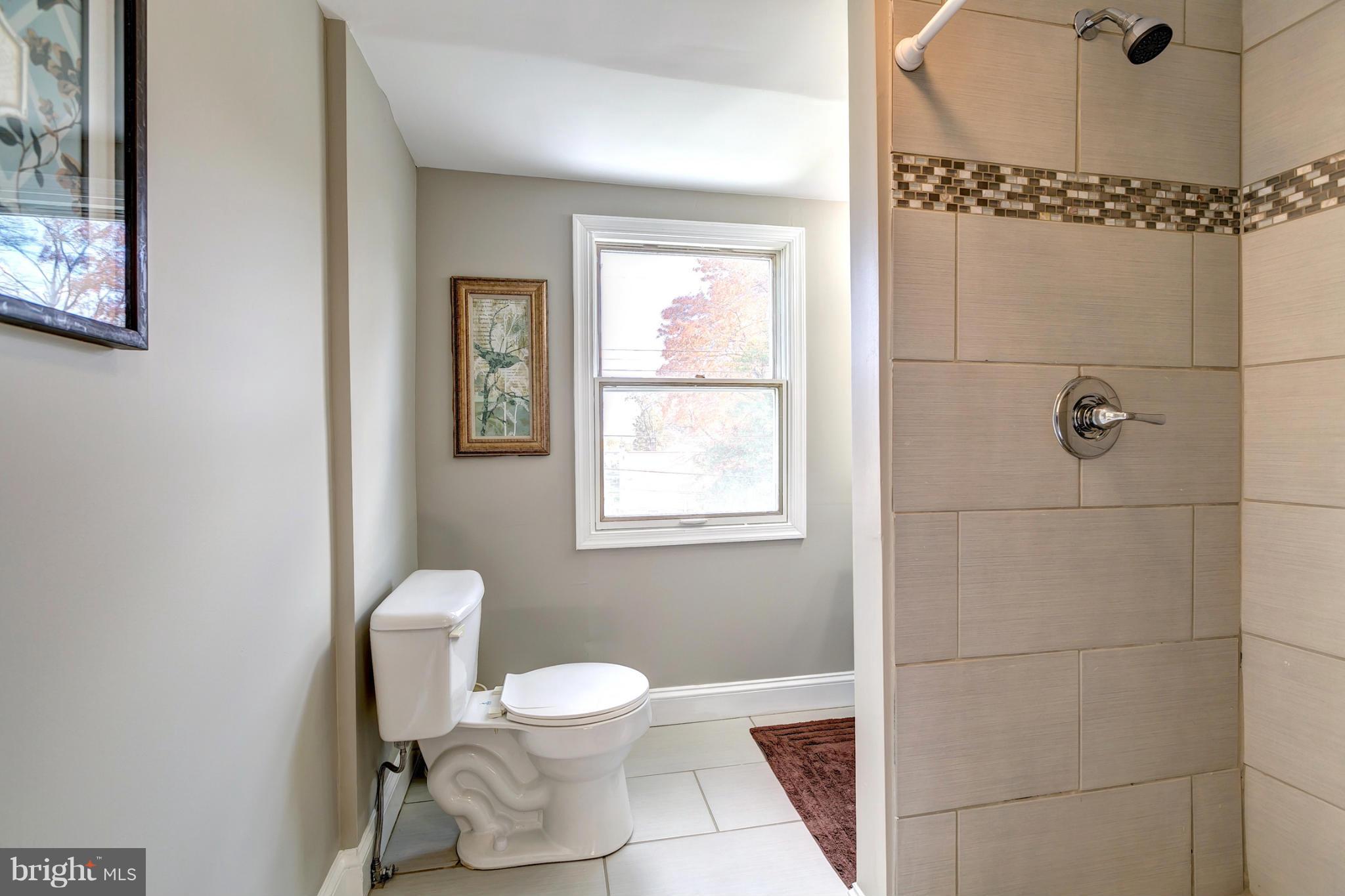 1825 Weyburn Road Baltimore, MD 21237 - Photo 20 of 30 Custom Tile Finishes in Bath