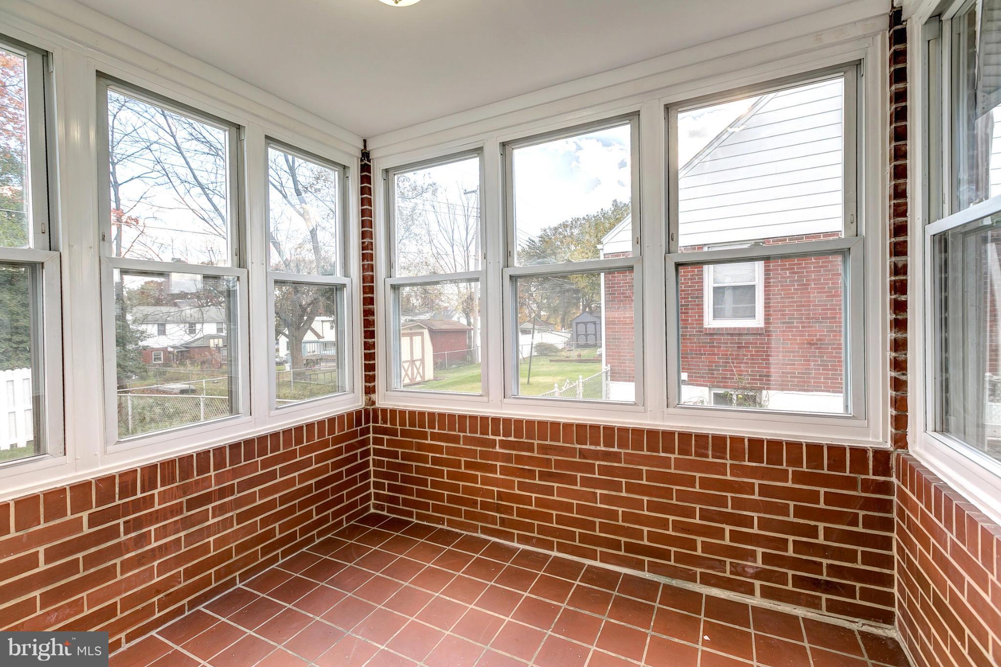 1825 Weyburn Road Baltimore, MD 21237 - Photo 25 of 30 Enclosed Patio