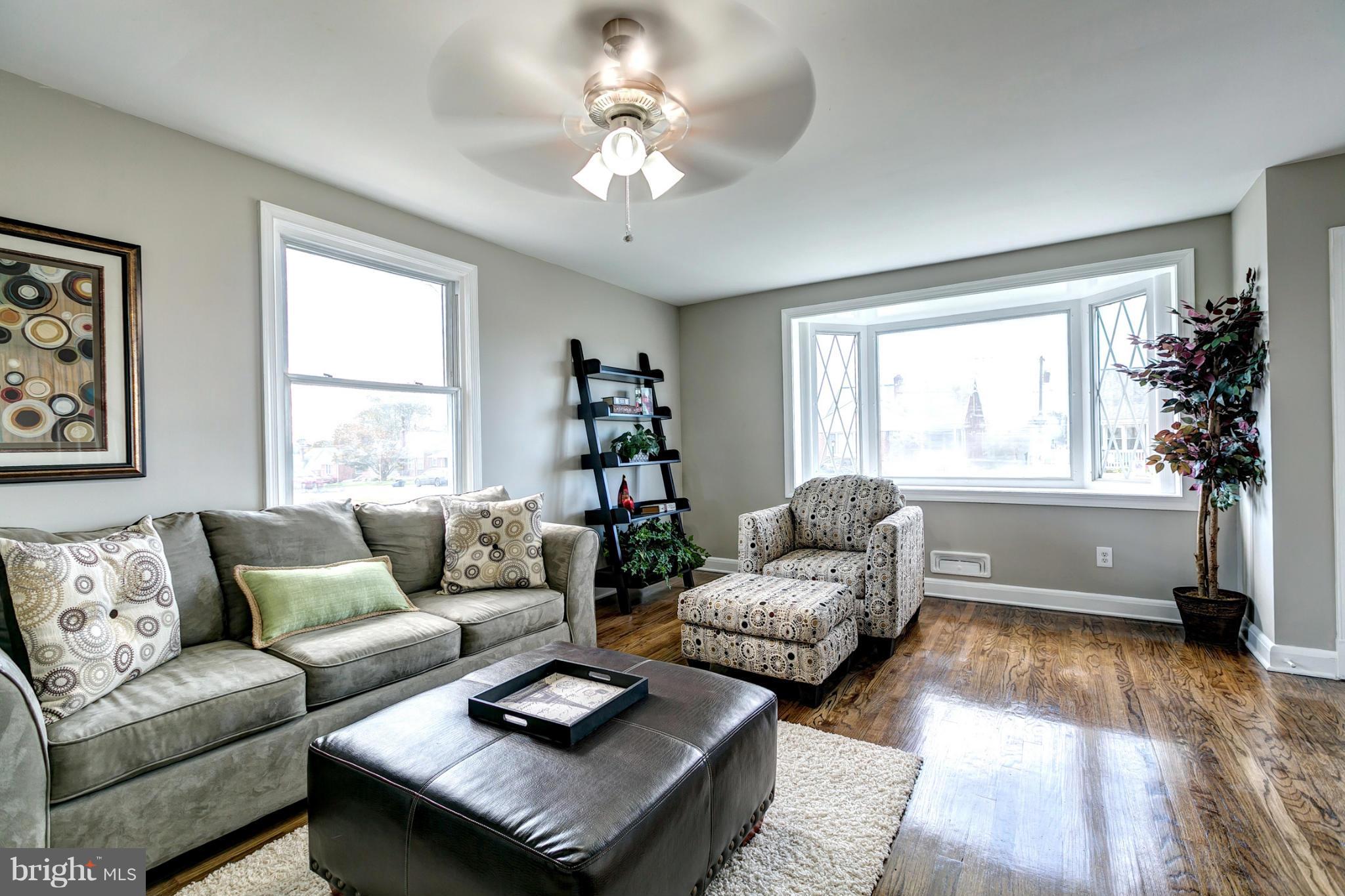 1825 Weyburn Road Baltimore, MD 21237 - Photo 5 of 30 Living Room With Beautiful Bay Windows