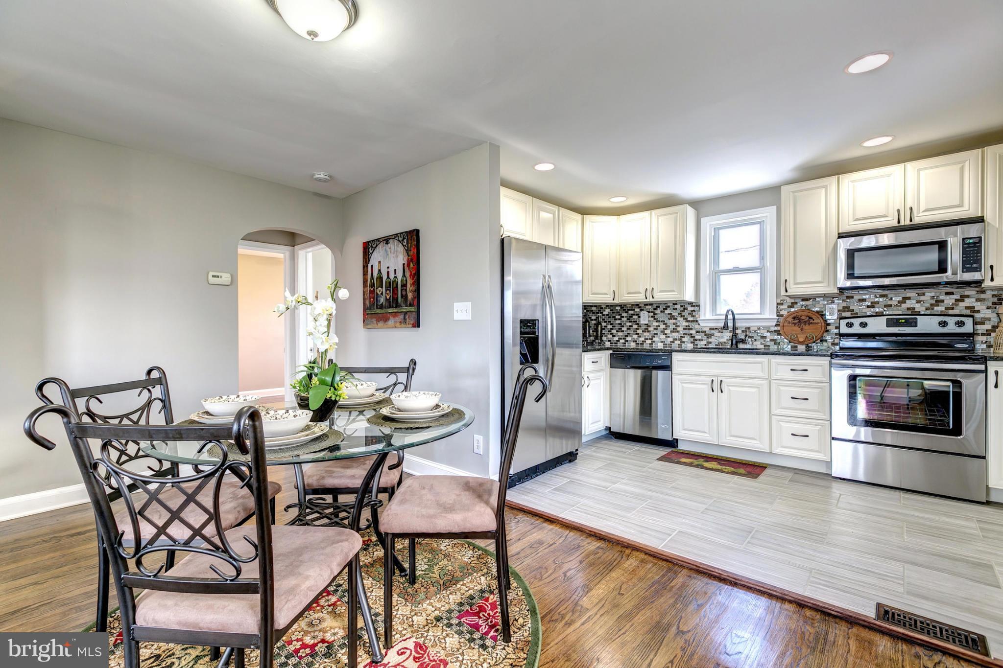 1825 Weyburn Road Baltimore, MD 21237 - Photo 9 of 30 Dining Room Opens To Chefs Kitchen