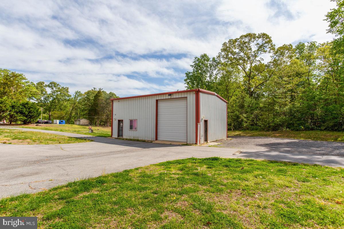 400 Adelina Road Prince Frederick, MD 20678 - Photo 14 of 57 Versatile industrial space in nature's embrace.