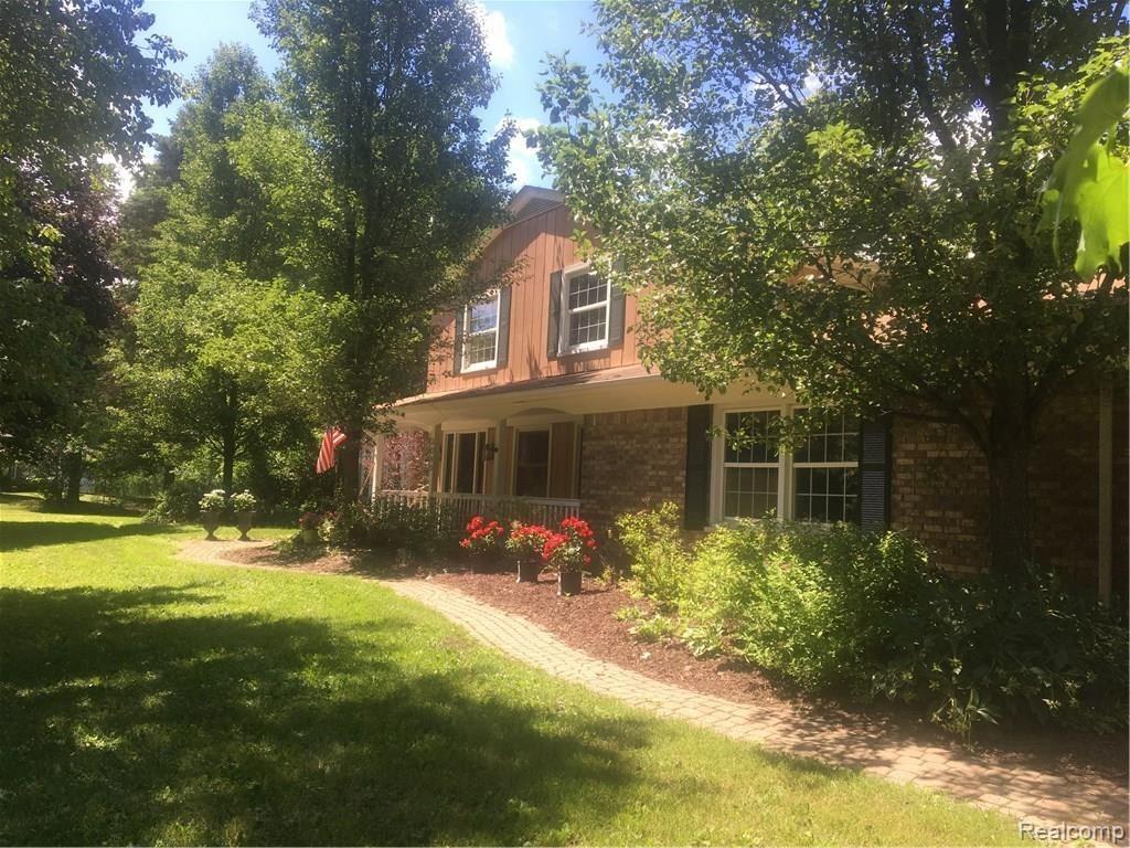 3080 Lake George Road Oakland, MI 48363 - Photo 1 of 17 Lake George New Exterior.jpg