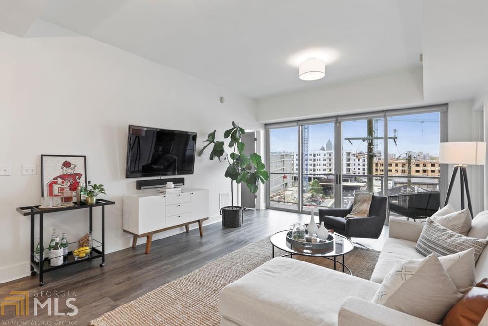 So much to love about this condo! Move-in ready with fresh paint, new gorgeous flooring (no carpet) and modern finishes.