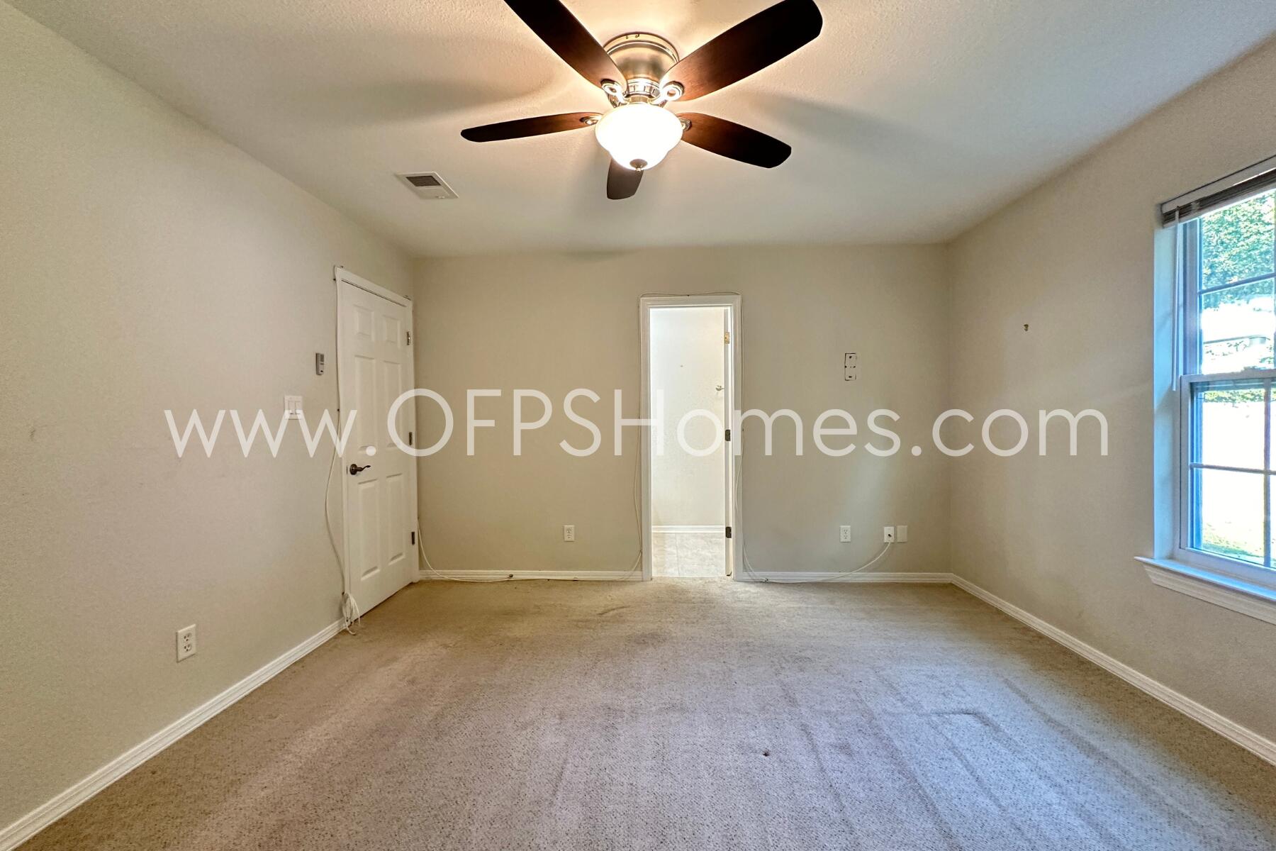 932 Emily Circle Fort Walton Beach, FL 32547 - Photo 15 of 20 a view of an empty room with a window
