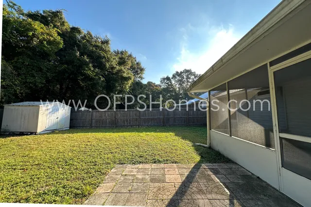 a view of swimming pool with a yard