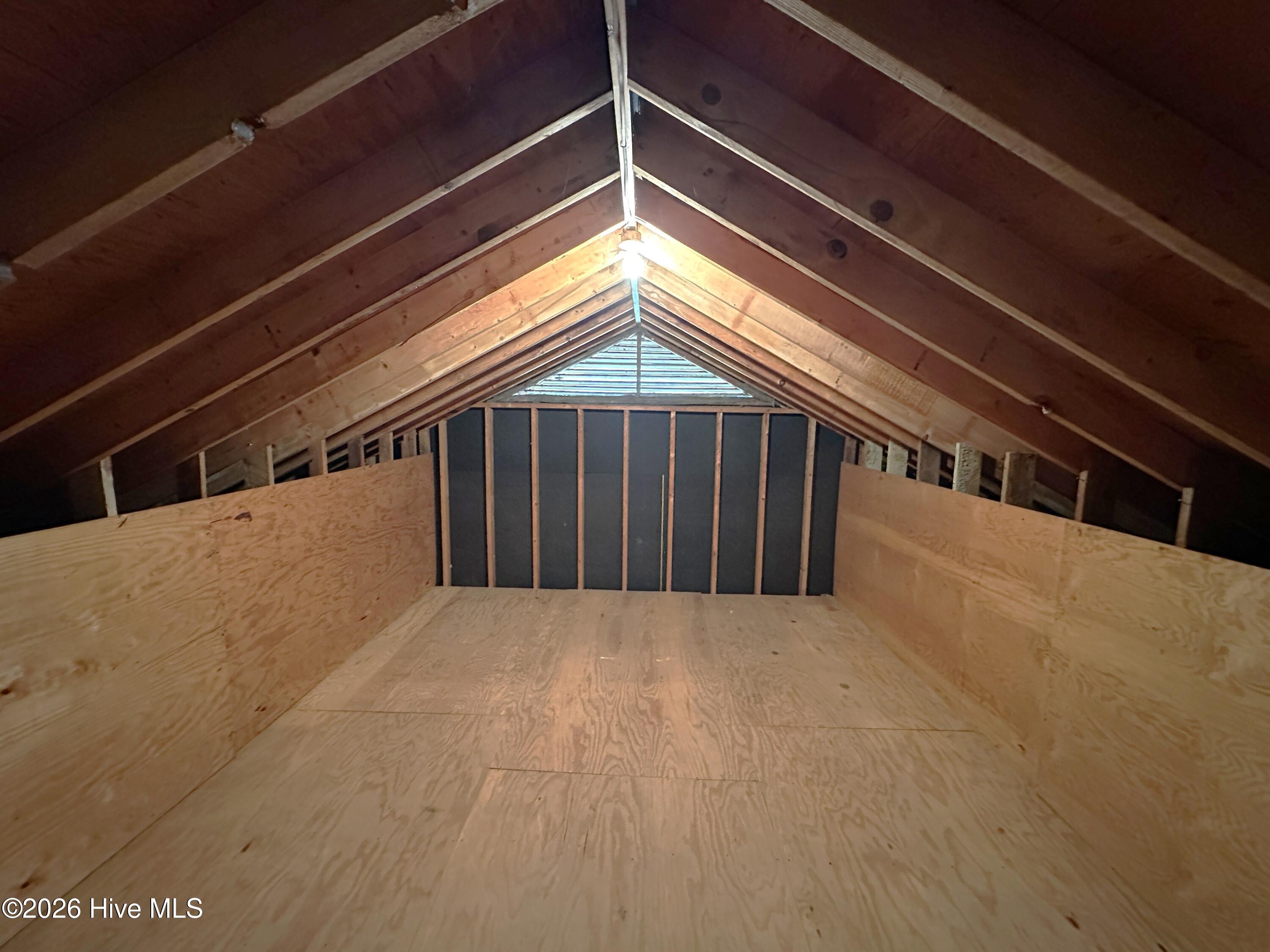 504 Pineview Road Clinton, NC 28328 - Photo 27 of 30 Additional floored walk-in attic storage area.