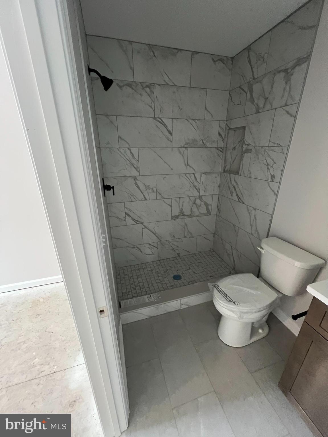 515 South Spring Street Martinsburg, WV 25401 - Photo 18 of 20 a bathroom with a toilet and a shower