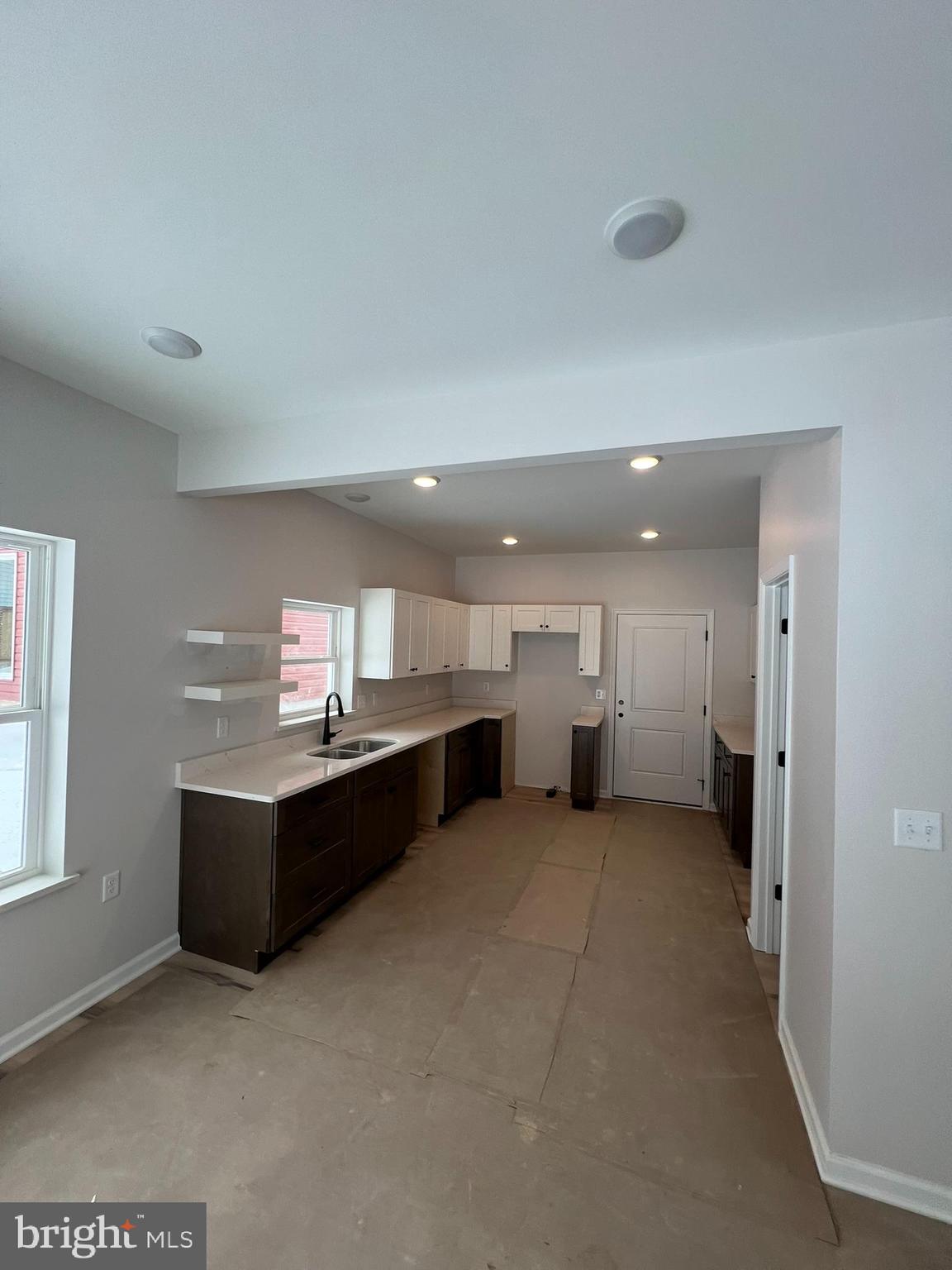 515 South Spring Street Martinsburg, WV 25401 - Photo 3 of 20 a view of a kitchen with a sink and cabinets