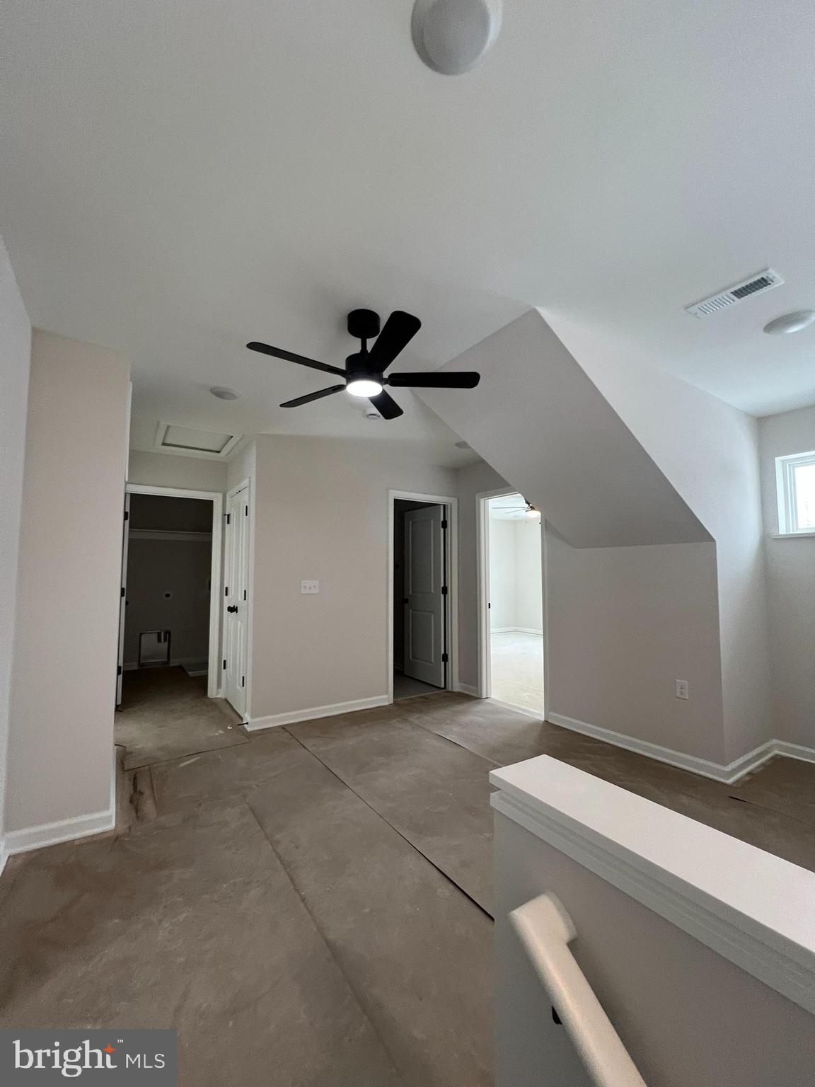 515 South Spring Street Martinsburg, WV 25401 - Photo 10 of 20 a view of a livingroom with a ceiling fan and window