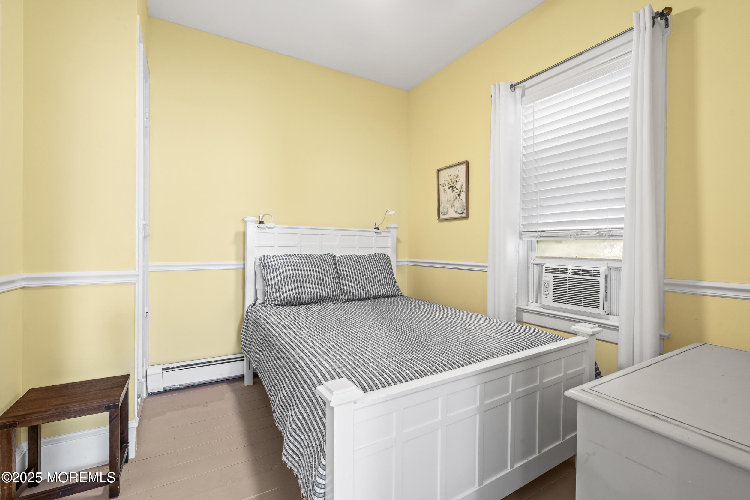 18 Abbott Avenue Ocean Grove, NJ 07756 - Photo 19 of 84 a bedroom with a bed and a table in it