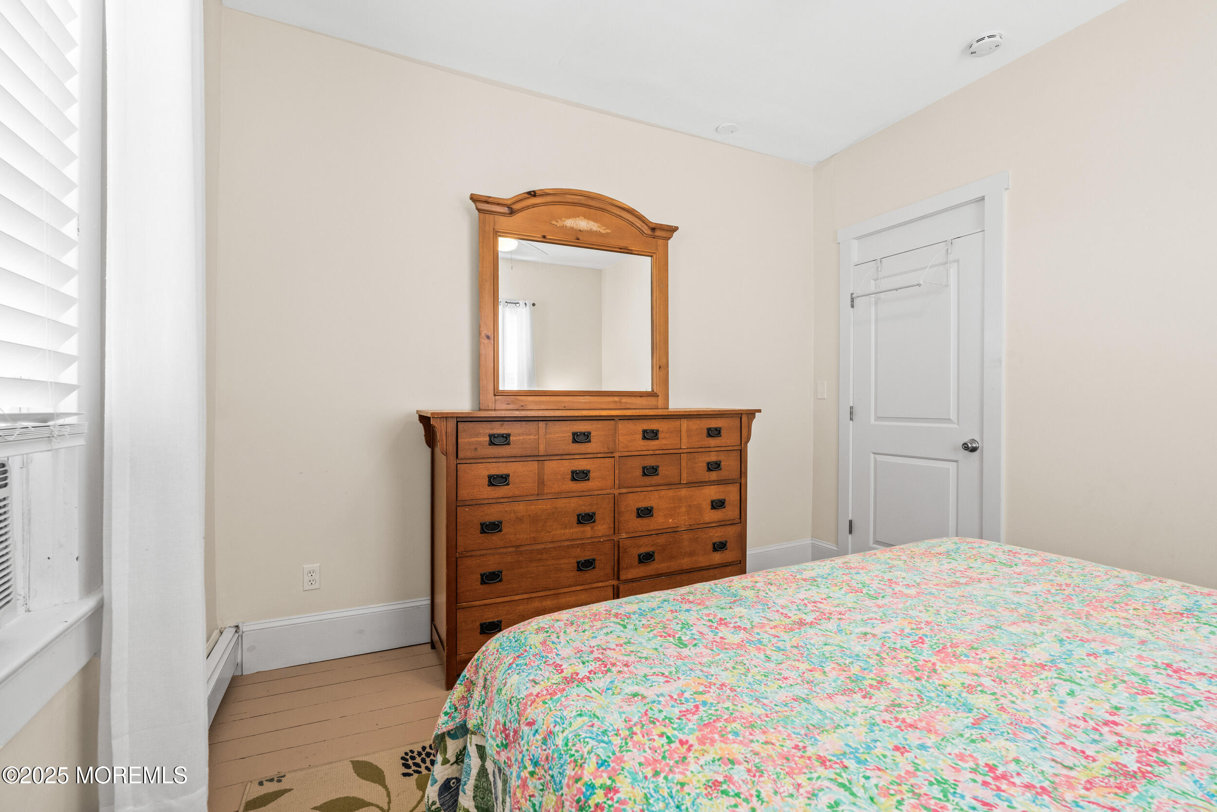 18 Abbott Avenue Ocean Grove, NJ 07756 - Photo 27 of 84 a bedroom with a bed and a dresser