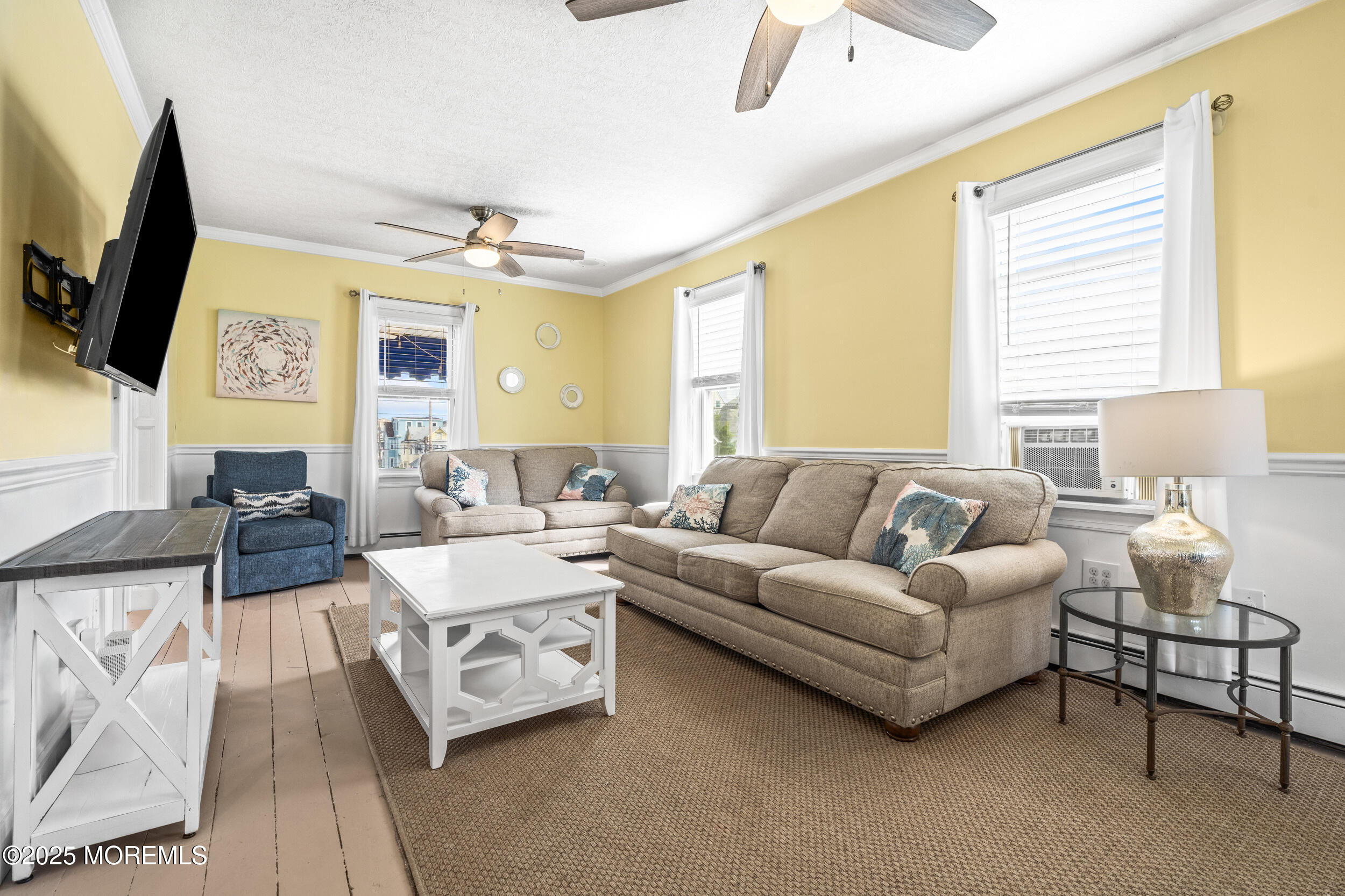 18 Abbott Avenue Ocean Grove, NJ 07756 - Photo 44 of 84 a living room with furniture and a flat screen tv