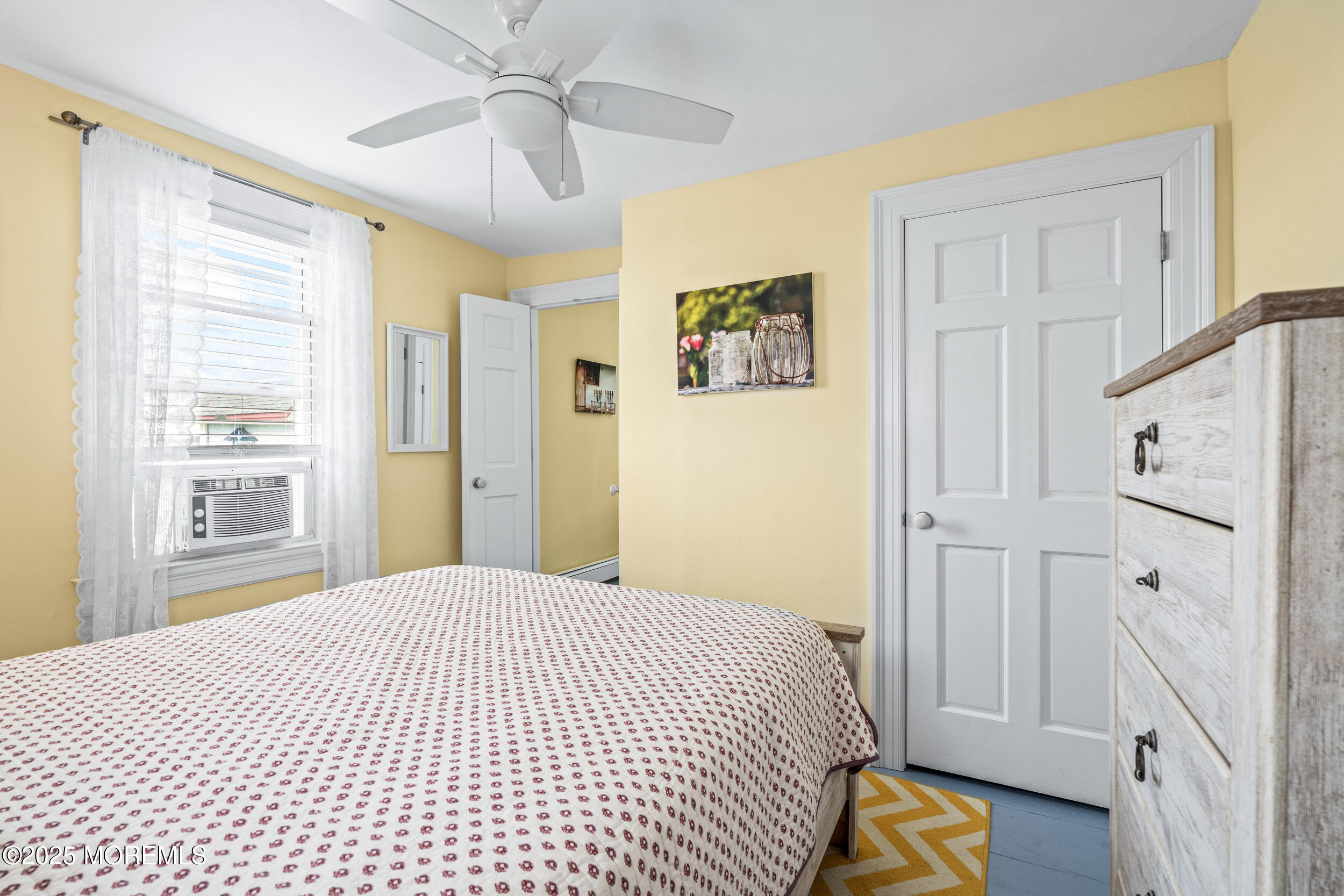 18 Abbott Avenue Ocean Grove, NJ 07756 - Photo 51 of 84 a bedroom with a bed and a window