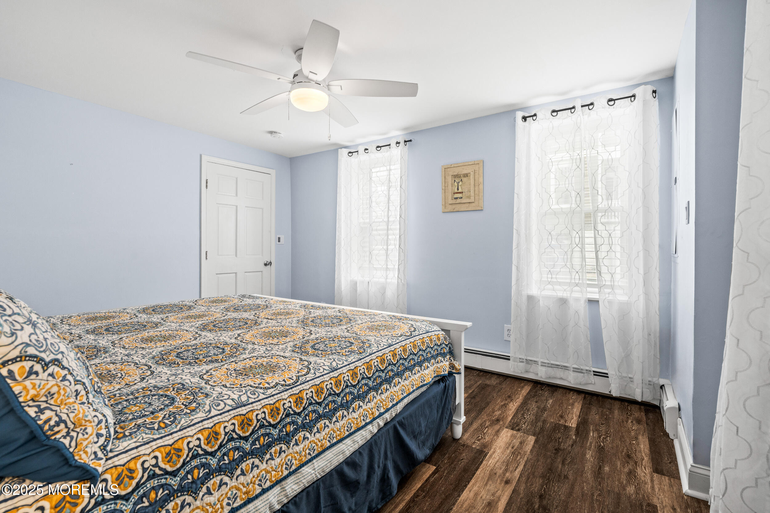 18 Abbott Avenue Ocean Grove, NJ 07756 - Photo 69 of 84 a bedroom with a bed and a window