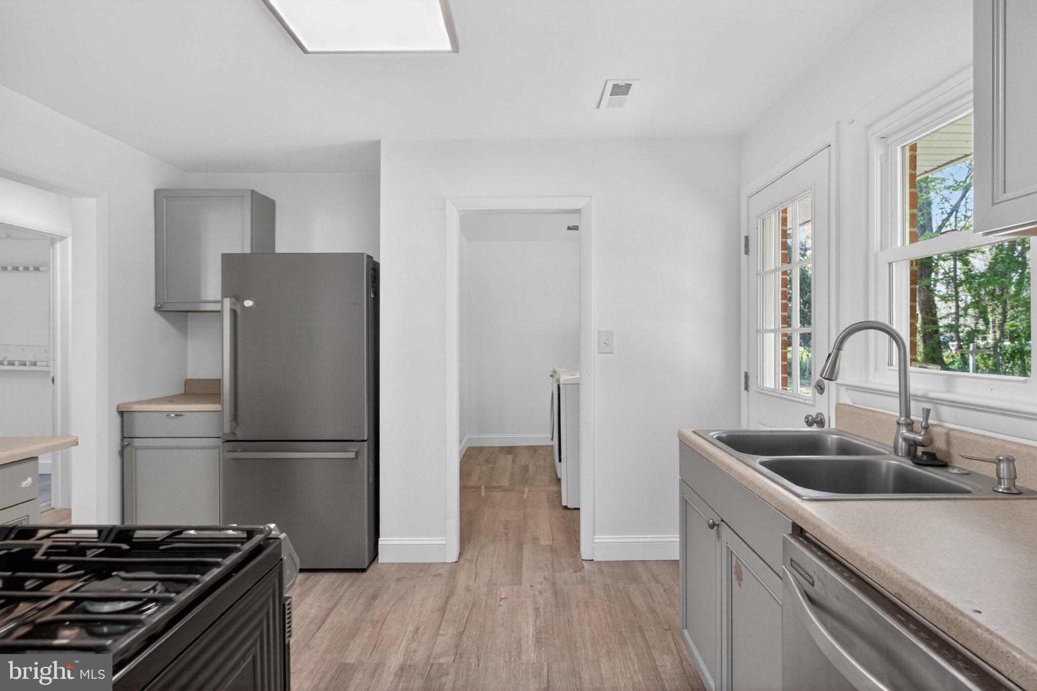 45278 Cove Manor Road California, MD 20619 - Photo 13 of 24 Modern kitchen with sleek finishes.