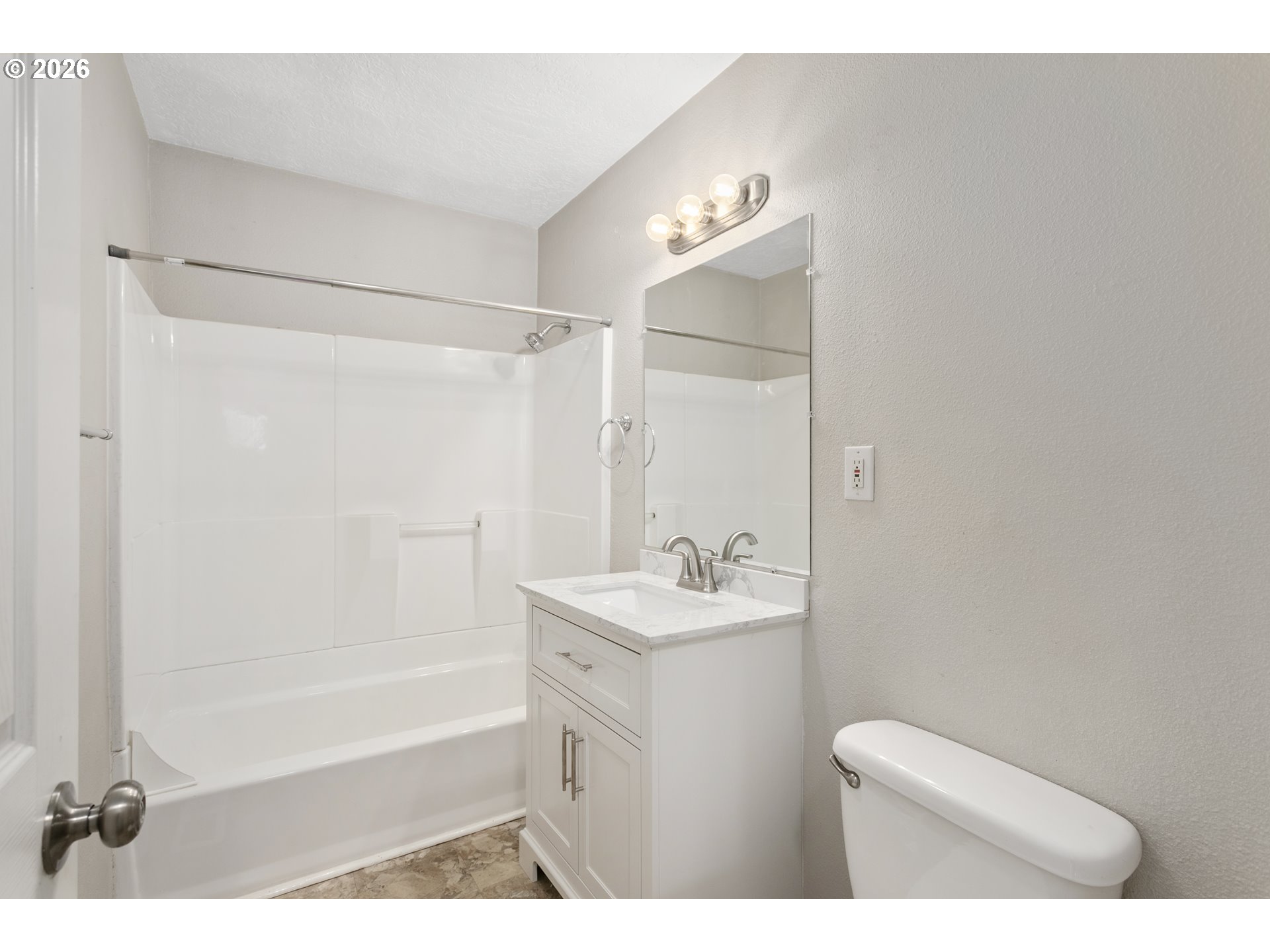 8705 Southeast Pardee Street Portland, OR 97266 - Photo 18 of 32 a bathroom with a sink a toilet and shower