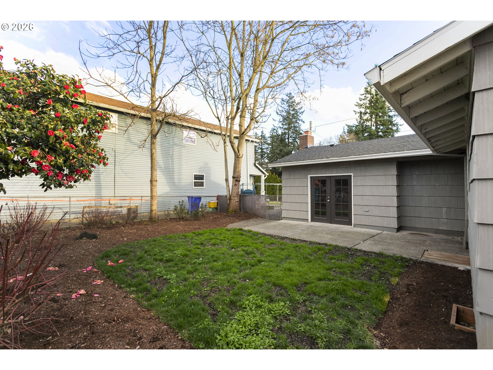 8705 Southeast Pardee Street Portland, OR 97266 - Photo 28 of 32 a view of a backyard with a garden