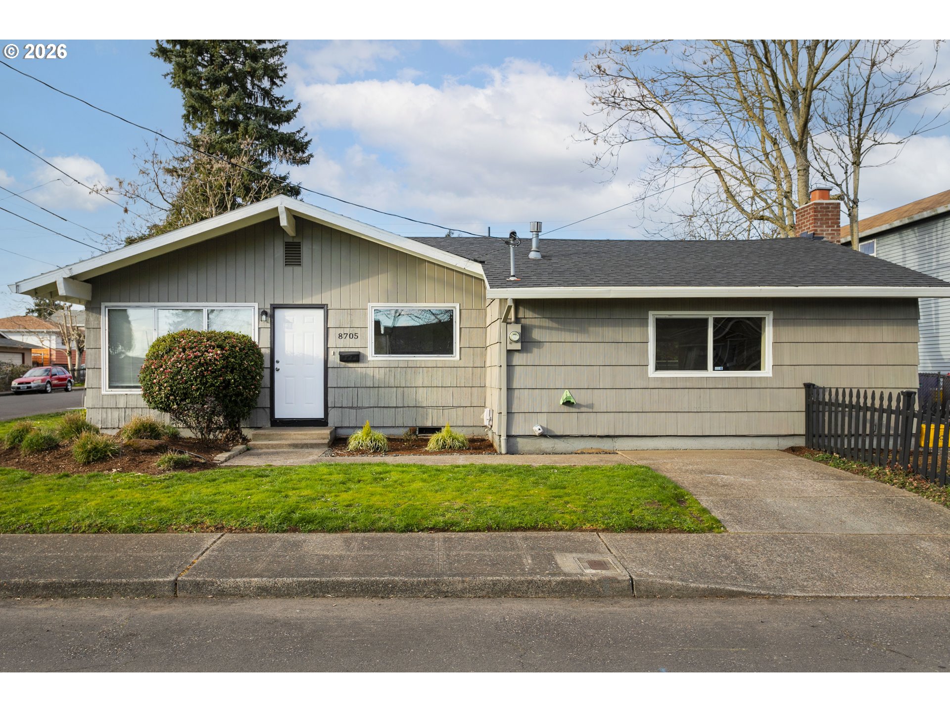 8705 Southeast Pardee Street Portland, OR 97266 - Photo 30 of 32 a view of a house with a yard