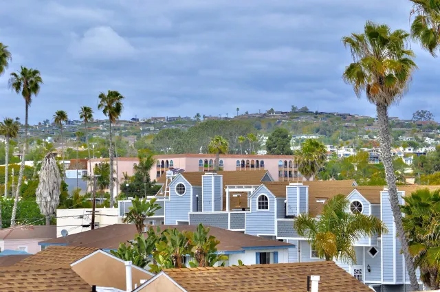 a view of a city with tall buildings