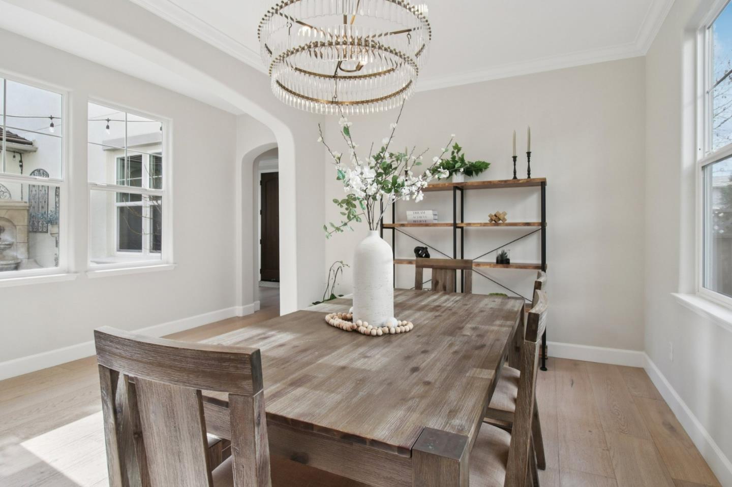7670 MacKenzie Way Gilroy, CA 95020 - Photo 13 of 70 a view of a dining room with furniture and wooden floor