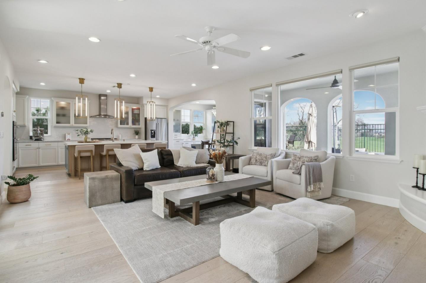 7670 MacKenzie Way Gilroy, CA 95020 - Photo 24 of 70 a living room with lots of furniture and view of kitchen