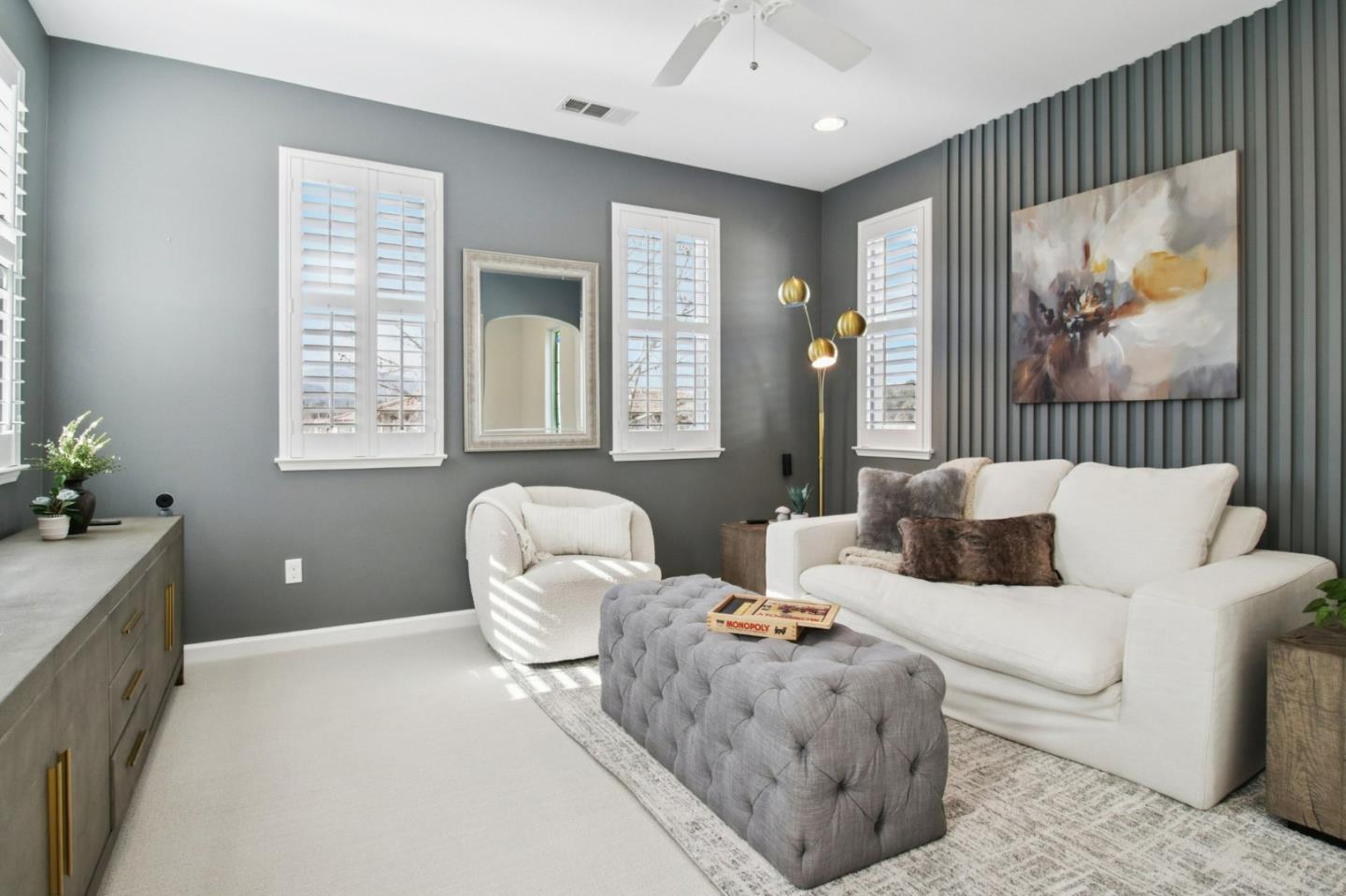 7670 MacKenzie Way Gilroy, CA 95020 - Photo 31 of 70 a spacious bedroom with a bed and a painting on the wall