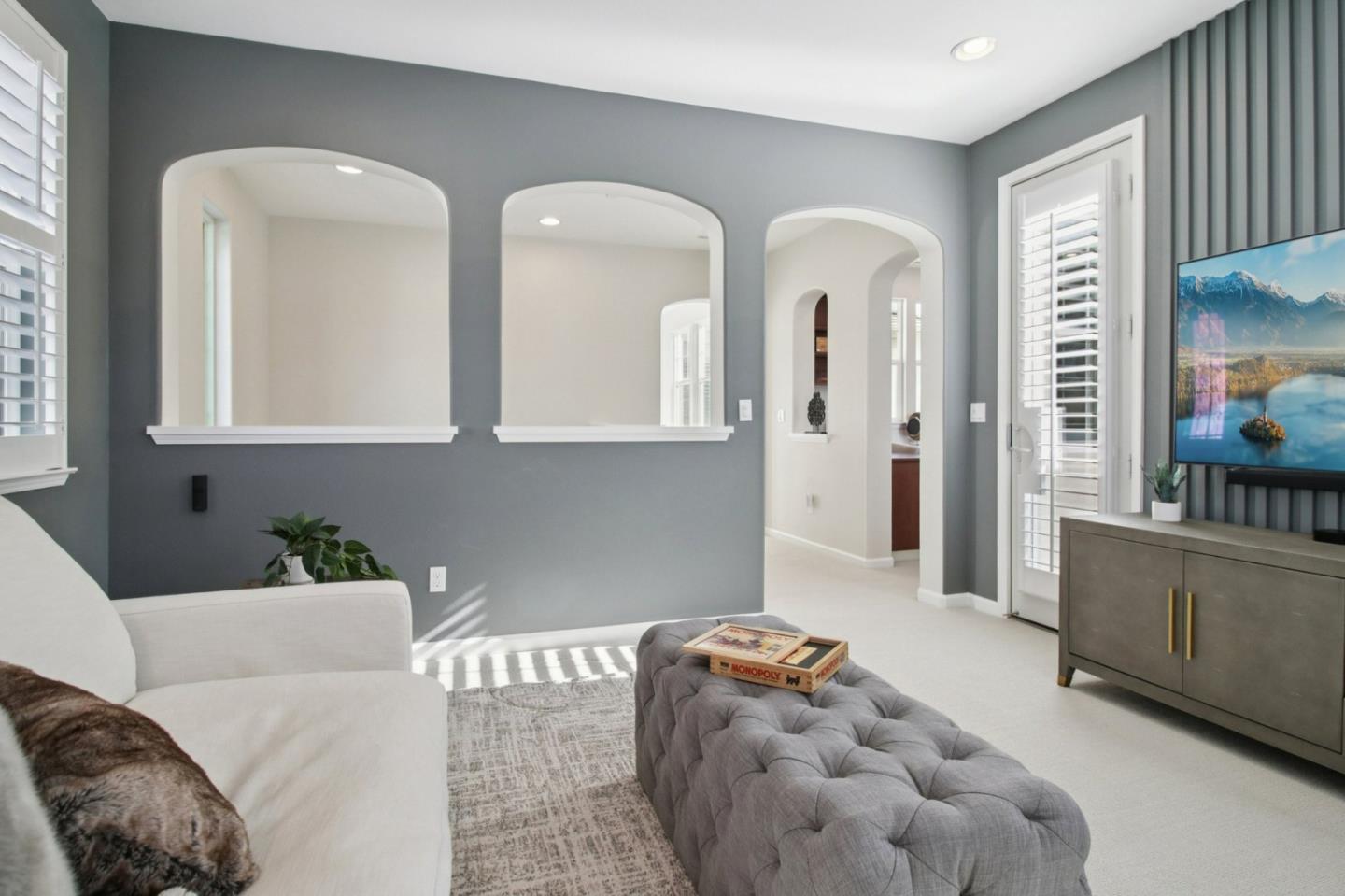 7670 MacKenzie Way Gilroy, CA 95020 - Photo 33 of 70 a living room with furniture and a window