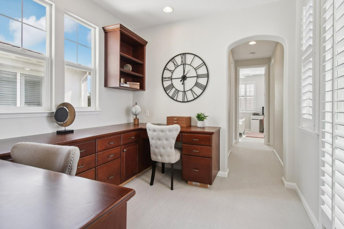 7670 MacKenzie Way Gilroy, CA 95020 - Photo 35 of 70 a living room with furniture and a window