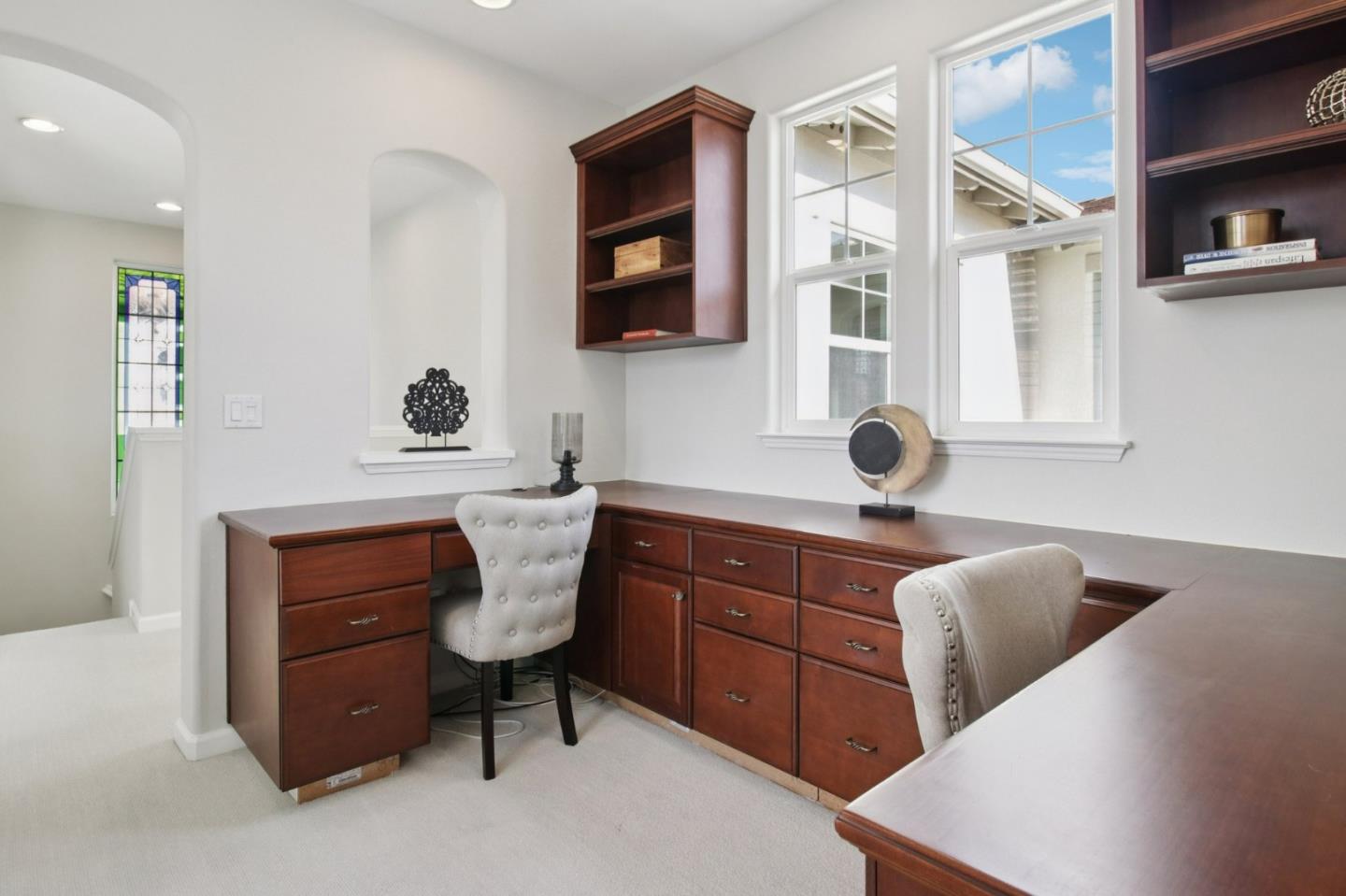 7670 MacKenzie Way Gilroy, CA 95020 - Photo 36 of 70 a bathroom with a toilet a sink and mirror