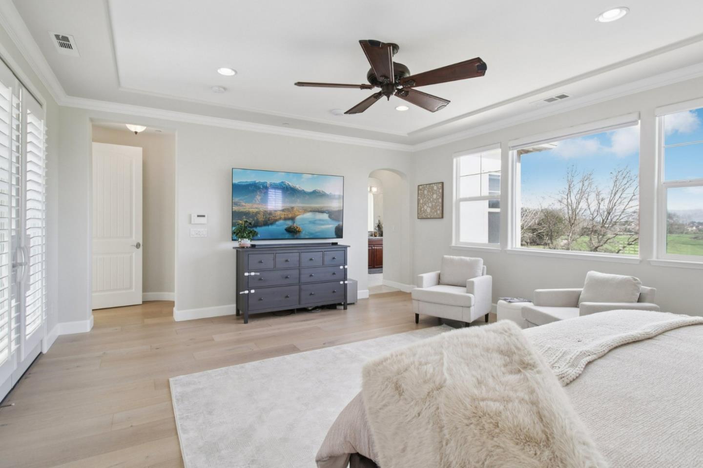 7670 MacKenzie Way Gilroy, CA 95020 - Photo 46 of 70 a living room with furniture and a large window
