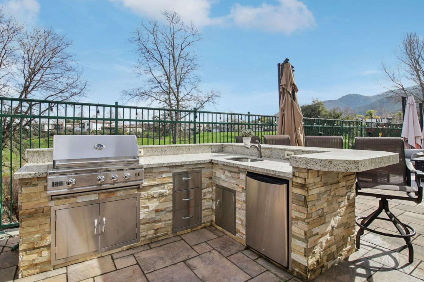 7670 MacKenzie Way Gilroy, CA 95020 - Photo 63 of 70 a kitchen with a stove and cabinets