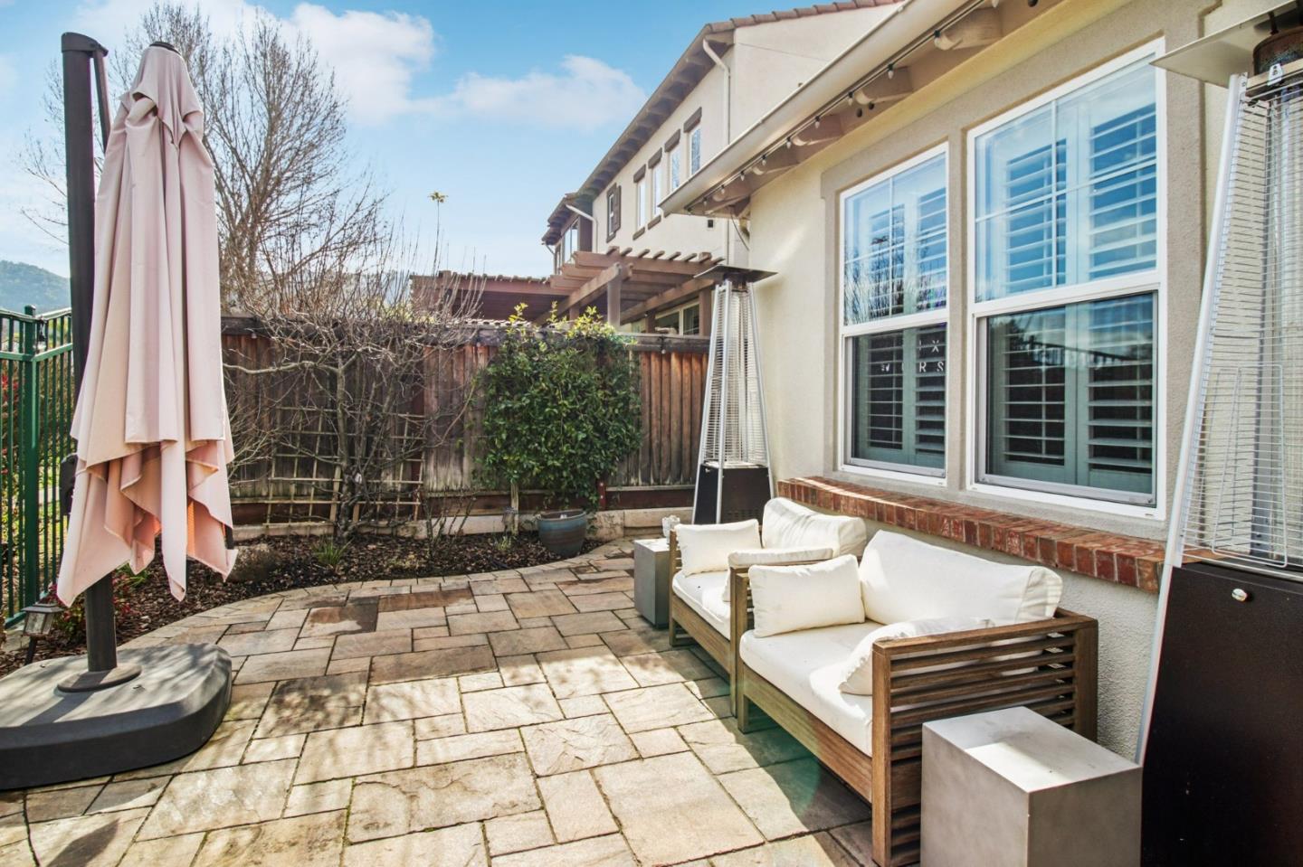 7670 MacKenzie Way Gilroy, CA 95020 - Photo 66 of 70 a view of a patio with couches and potted plants