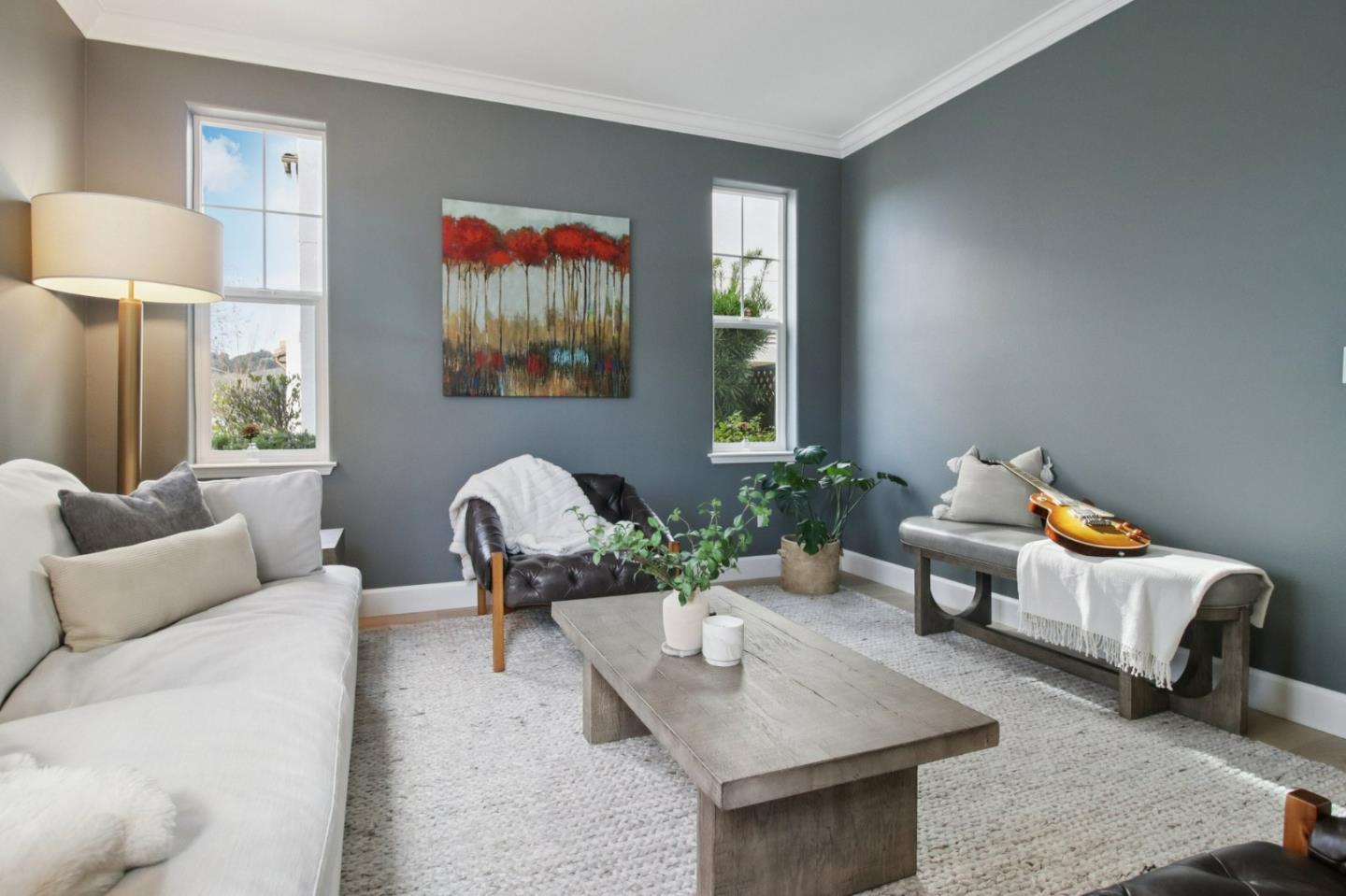 7670 MacKenzie Way Gilroy, CA 95020 - Photo 10 of 70 a living room with furniture and a potted plant