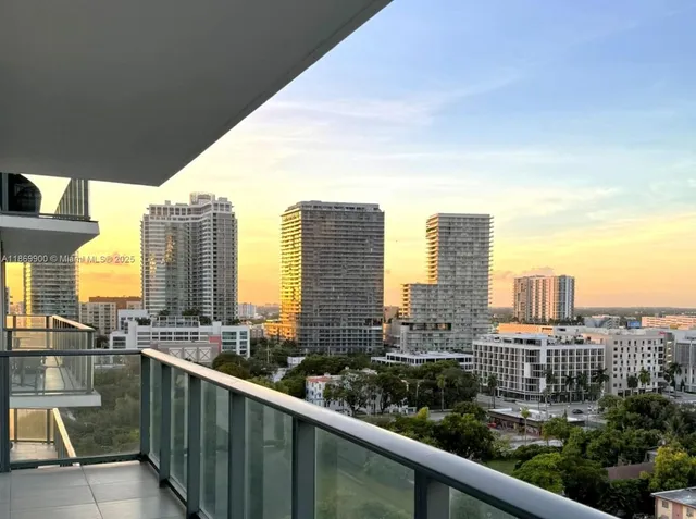 a view of a city from a balcony