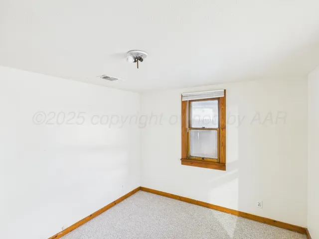 a view of a small space with a window