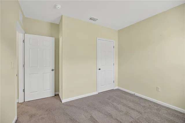 a view of a workspace with furniture